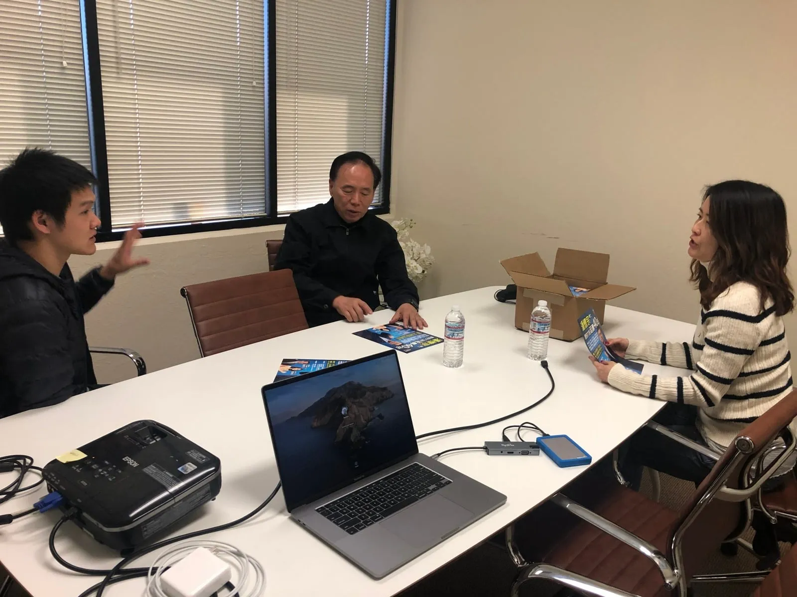 Foundation team members meeting around a table