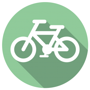 white bicycle on green background icon