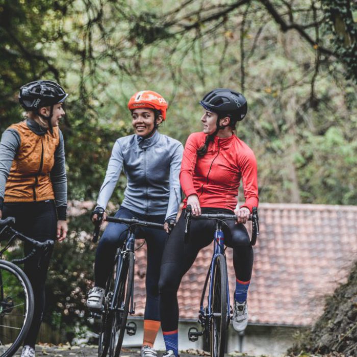 3 women on bicycles outdoors